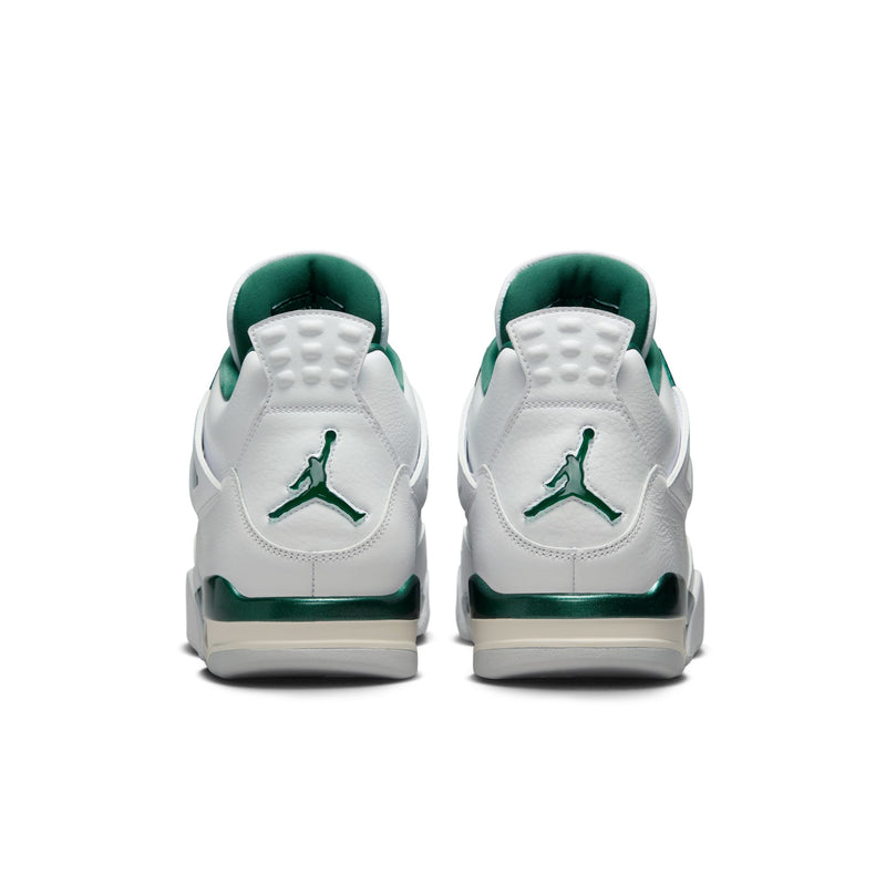 The Air Jordan 4 sneakers in white leather with Oxidised Green accents, featuring metallic lustre on the eyelets, midsole, and branding.