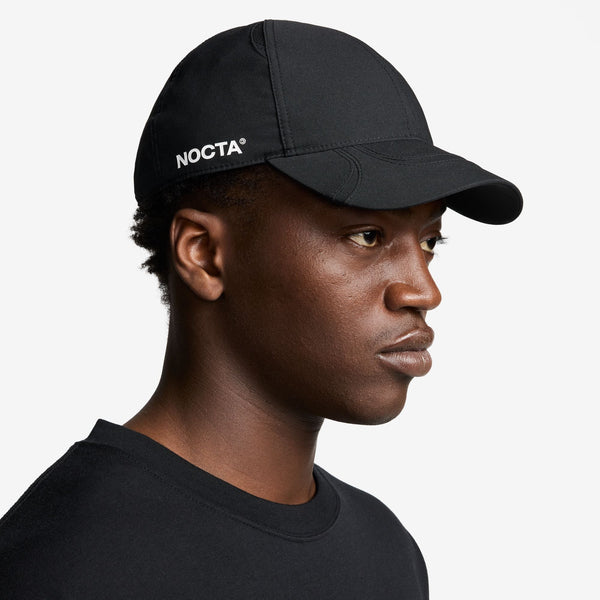 Sleek and stylish NOCTA Sports Hat featuring printed graphics and a NOCTA branded slide buckle for adjustable fit.