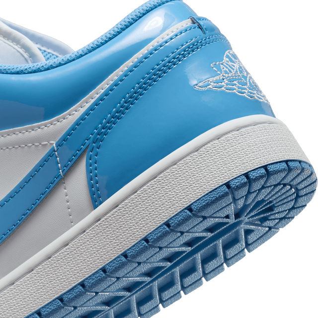 Air Jordan 1 with university-inspired color blocking, premium patent leather upper, and durable rubber outsole.