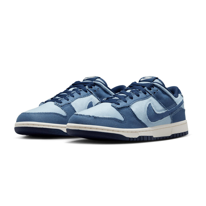 Denim-inspired Dunk Low with tonal blocking, soft upper, foam midsole, and durable rubber outsole.