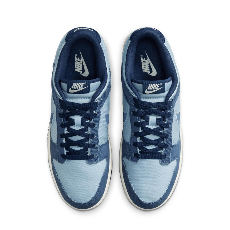 Denim-inspired Dunk Low with tonal blocking, soft upper, foam midsole, and durable rubber outsole.