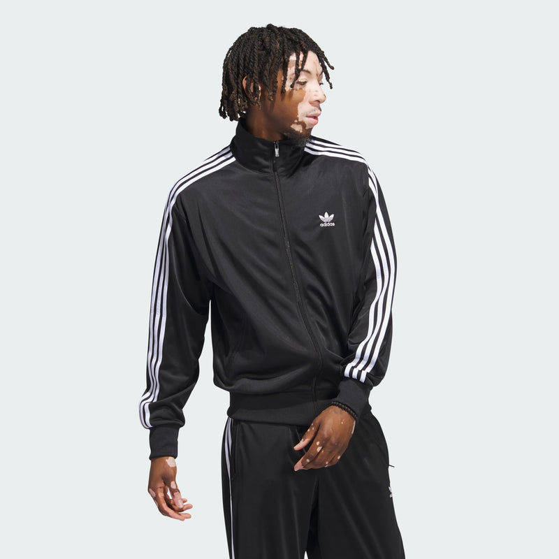 Adidas Firebird Adicolor Track Jacket with embroidered Trefoil logo, 3-Stripes on sleeves, and stand-up collar, offering a modern twist on the classic style.