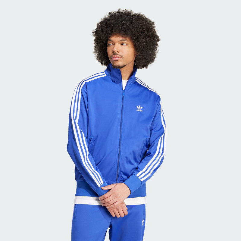 adidas Adicolor Firebird Jacket showcasing timeless style with vibrant color scheme, embroidered Trefoil logo on chest, 3-Stripes on arms, stand-up collar, zip pockets, and ribbed cuffs for comfort and functionality.