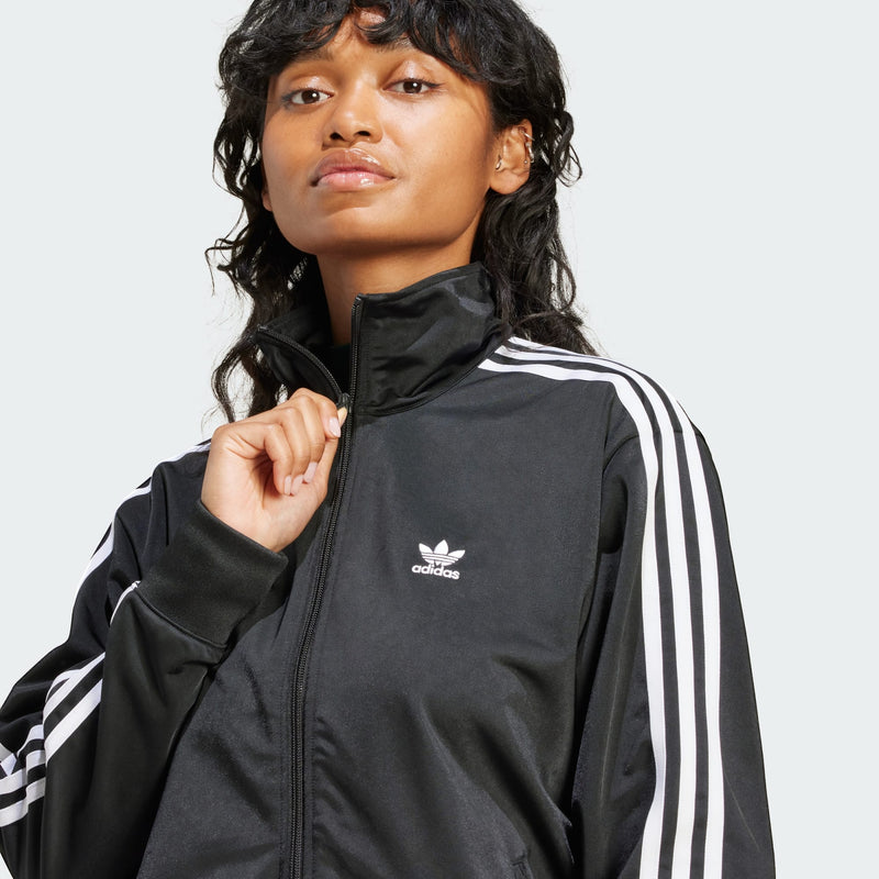 Adidas Originals Firebird track top in shiny recycled tricot with stand-up collar and 3-Stripes sleeves.


