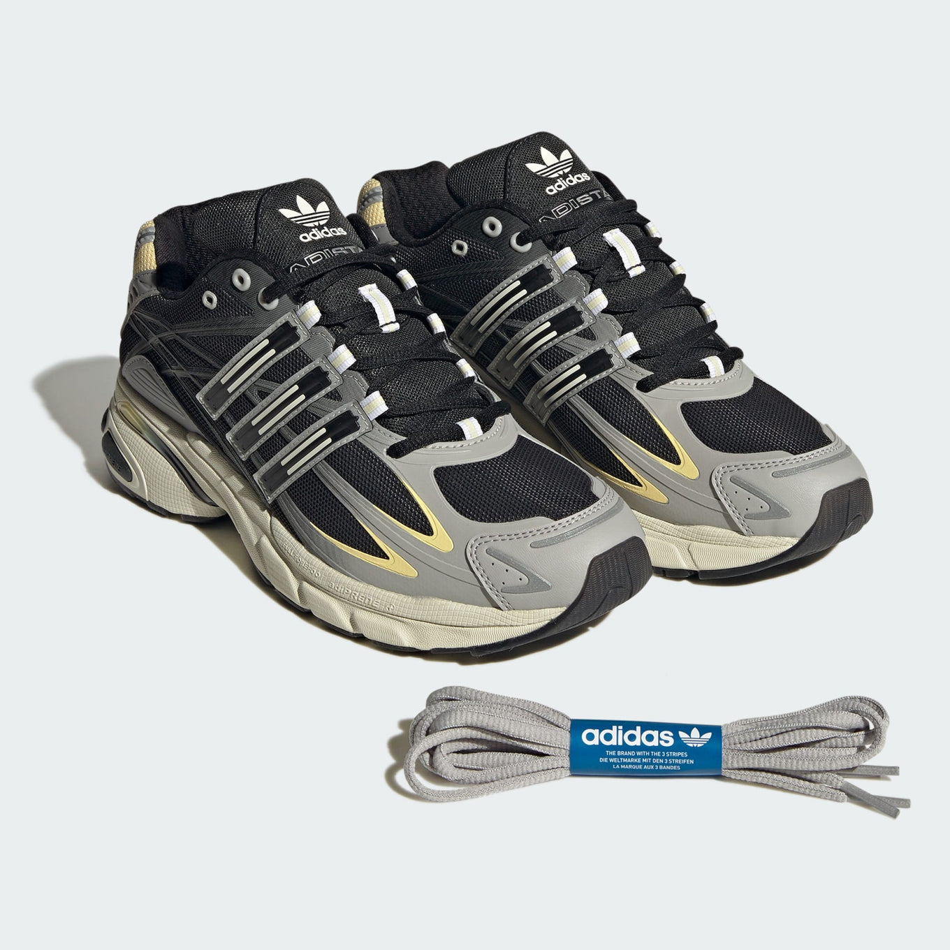 adidas Adistar shoes with a textile and leather upper, durable rubber outsole, blending performance heritage with sophisticated style.