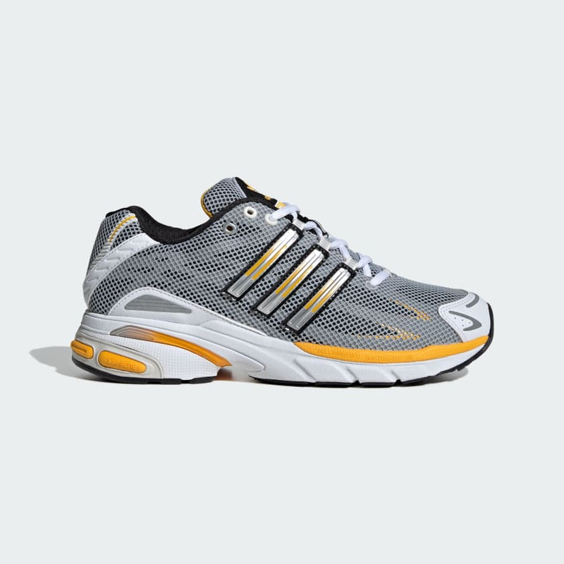 Adidas Adistar Cushion Shoes with breathable mesh upper, Adiprene cushioning, and metallic reflective details, combining retro style with modern comfort.