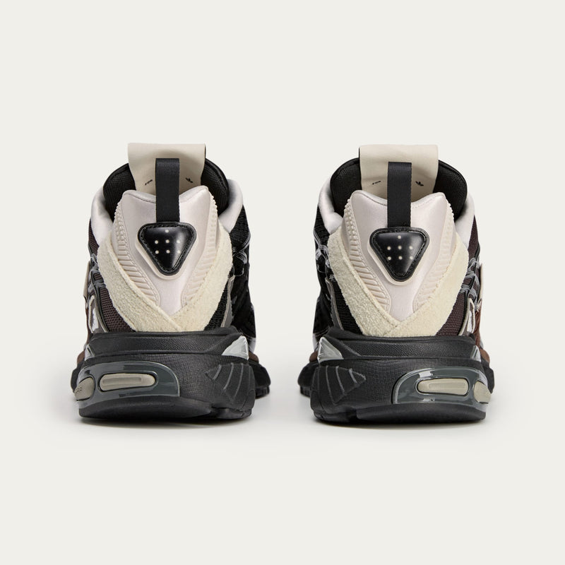 Song For The Mute x adidas footwear collection featuring Core Black Dark Brown, Shadow Green, and Taupe Metallic colorways with unique mesh weaves, velvet-like satin Three Stripes, and synthetic textured leather.