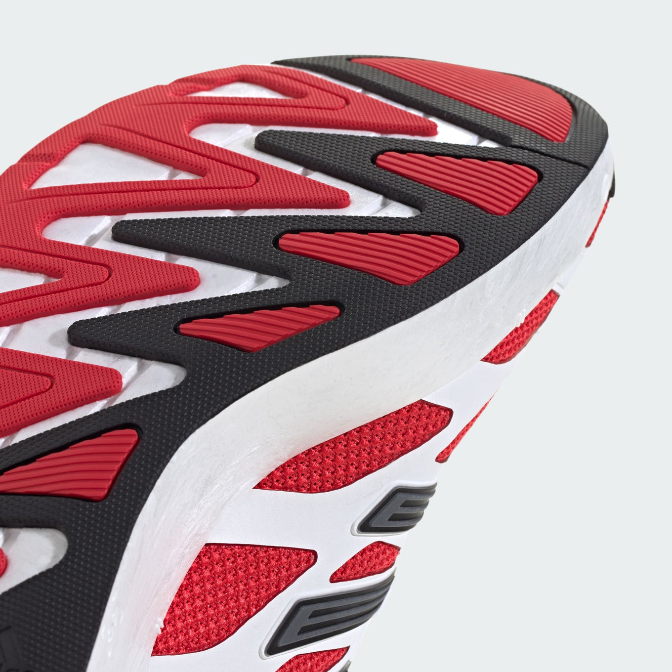 adidas Adizero Aruku sneakers with a curved rocker midsole, Swirlfoam cushioning, and heritage-inspired design details for ultimate comfort and style.
