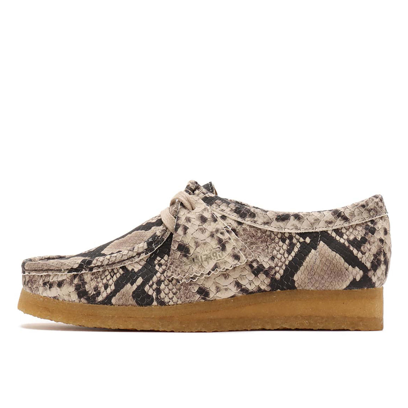 Grey snake leather Clarks Wallabee shoe with classic lace-up design and crepe sole