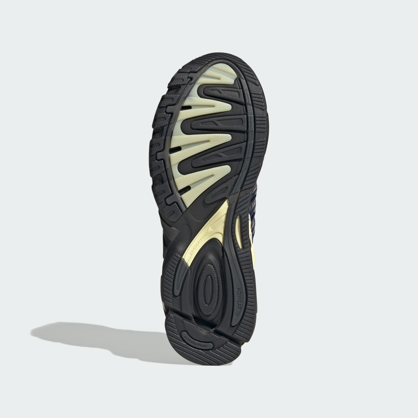 adidas Response CL Seoul sneaker featuring a multi-material upper, layered overlays, and a chunky rubber outsole for a bold, early 2000s-inspired look.