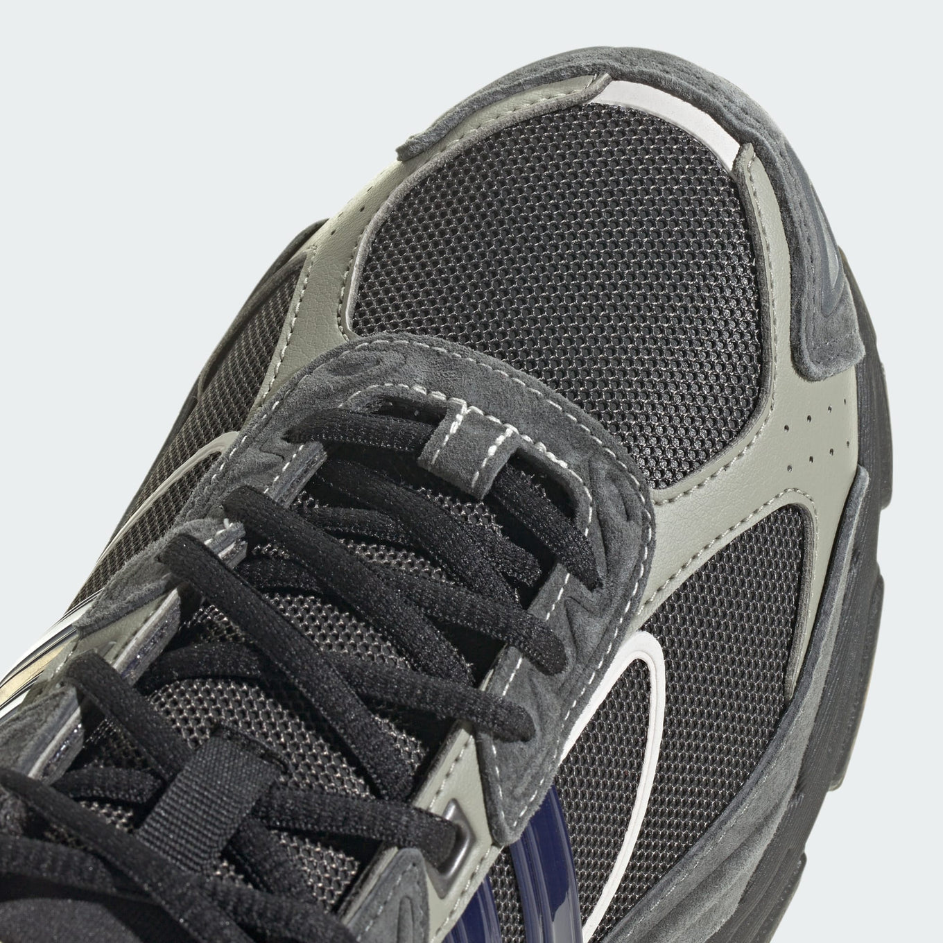 adidas Response CL Seoul sneaker featuring a multi-material upper, layered overlays, and a chunky rubber outsole for a bold, early 2000s-inspired look.