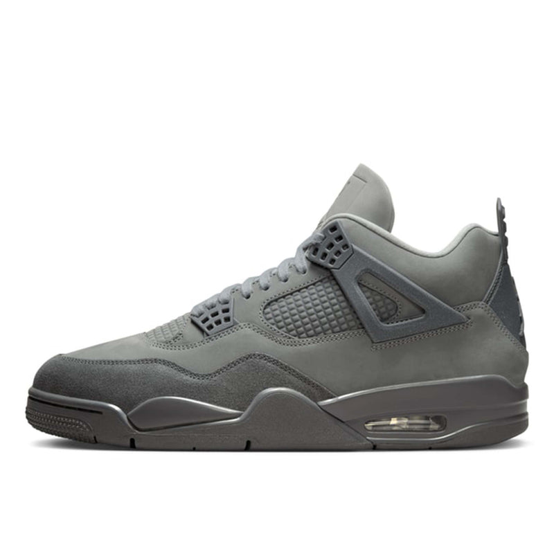 AJ4 'Wet Cement' sneaker in grey with nubuck leather and suede, inspired by Parisian cobblestone streets. The shoe showcases a rustic yet refined look, suitable for any urban setting.