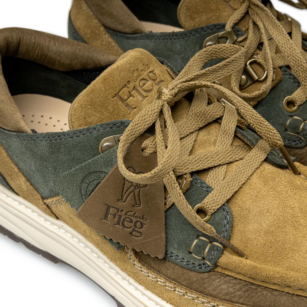 11th St by Ronnie Fieg x Clarks Originals Sunderland sneakers in Brown/Green, featuring C.F. Stead suede, nubuck collar, brass hardware, and cleated rubber outsole