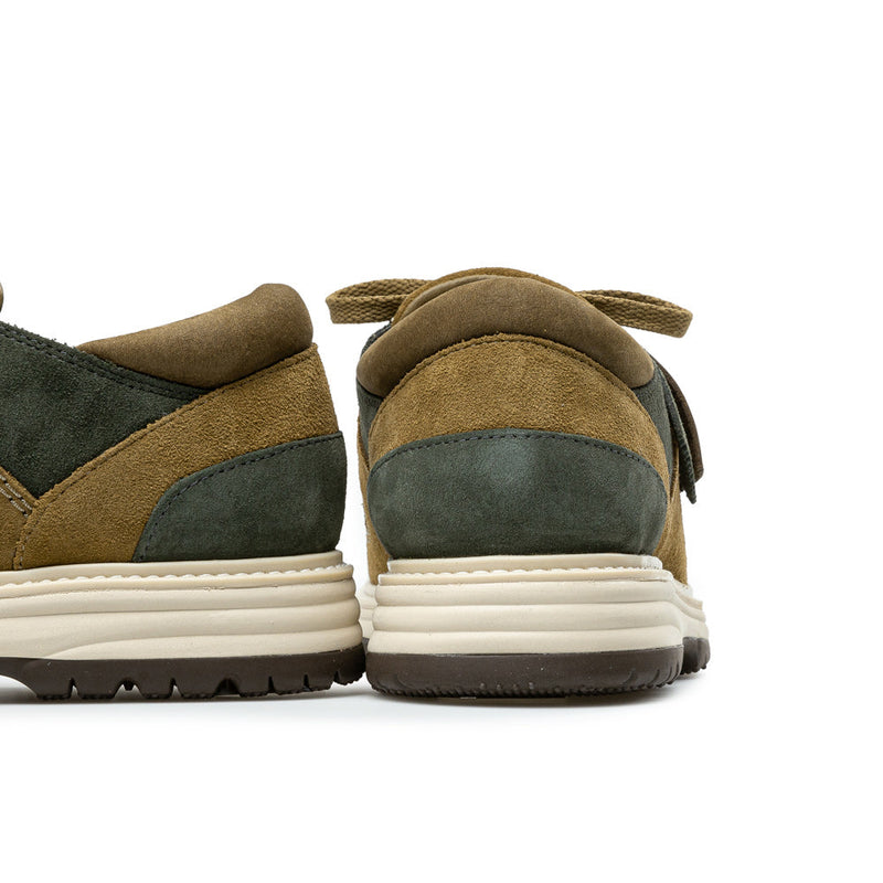 13th St by Ronnie Fieg x Clarks Originals Sunderland sneakers in Brown/Green, featuring C.F. Stead suede, nubuck collar, brass hardware, and cleated rubber outsole