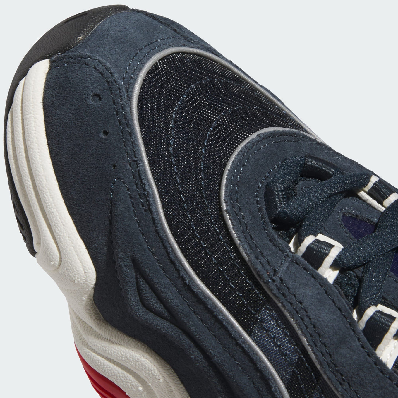 adidas Crazy 98 sneakers with a layered leather and mesh upper, showcasing ‘90s basketball heritage and a retro-futuristic design.