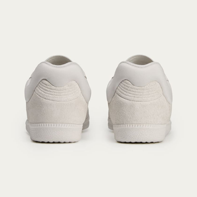 Dingyun Zhang x adidas Samba shoes with shorthair cow suede material, exaggerated elongated tongue, and a fusion of sci-fi and street culture influences.