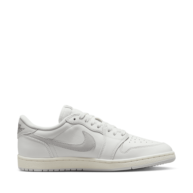 Classic AJ1 '85 Low sneaker crafted from premium leather, featuring Summit White, Light Smoke Grey, and Neutral Grey accents.