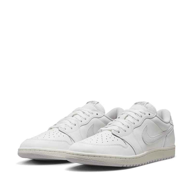 Classic AJ1 '85 Low sneaker crafted from premium leather, featuring Summit White, Light Smoke Grey, and Neutral Grey accents.