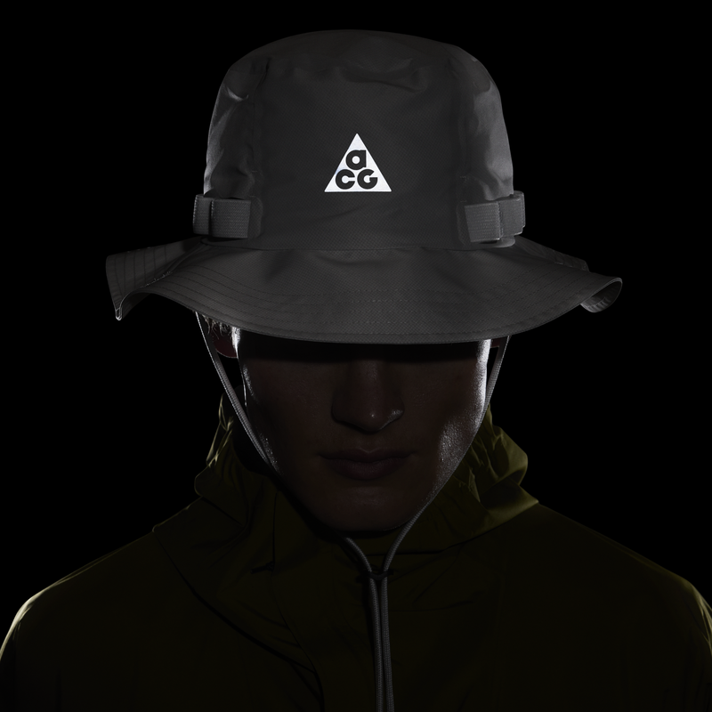 Nike ACG Apex Storm-FIT ADV bucket hat with weather protection technology, lightweight design, durable nylon construction, mesh lining for comfort, and stylish ACG accents.