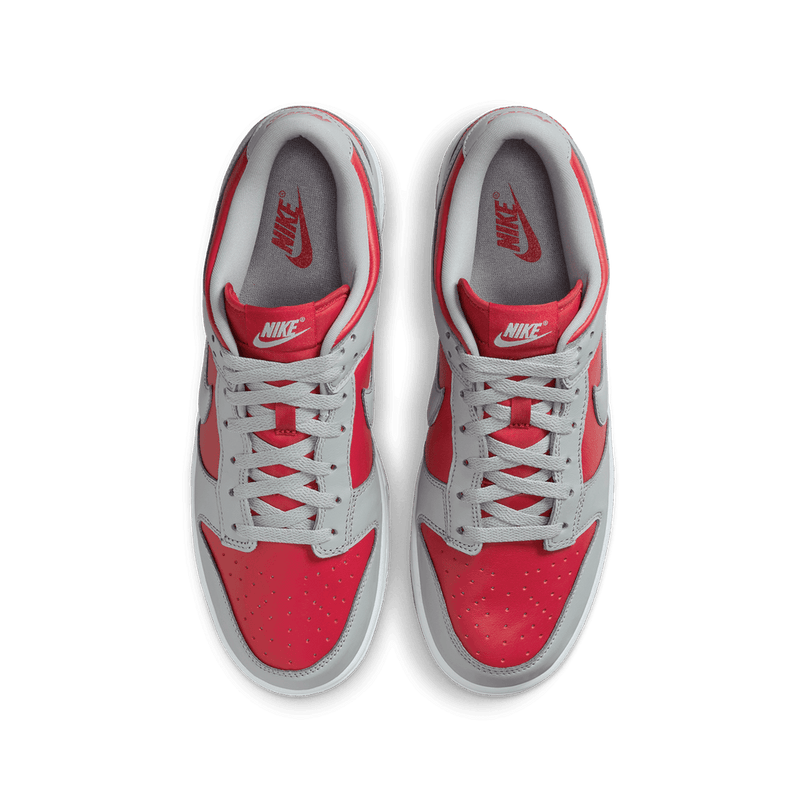 The Dunk Low, a timeless icon introduced over three decades ago on university basketball courts, has permeated popular culture, from skateboarding to modern art. 