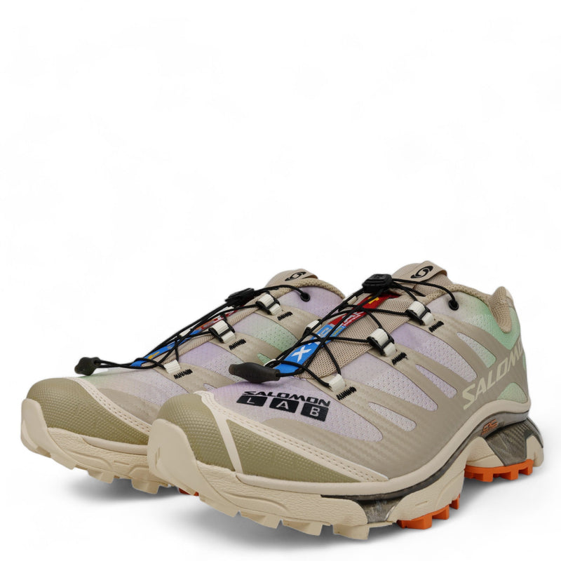 SALOMON XT-4 OG Aurora Borealis trail shoe with printed mesh upper, SensiFit™ synthetic/textile upper, Molded OrthoLite® sockliner, Quicklace™ lacing system, and Mud Contagrip® rubber outsole


