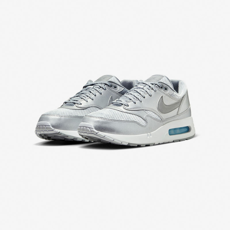 Nike Air Max 1 '86 Big Bubble in Metallic Silver and Cool Grey, featuring a reduced Air window, debossed branding on the tongue and heel, and a sleek, refined design.


