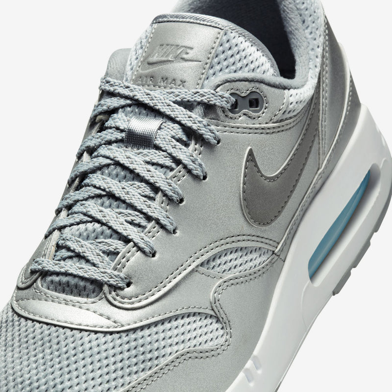 Nike Air Max 1 '86 Big Bubble in Metallic Silver and Cool Grey, featuring a reduced Air window, debossed branding on the tongue and heel, and a sleek, refined design.


