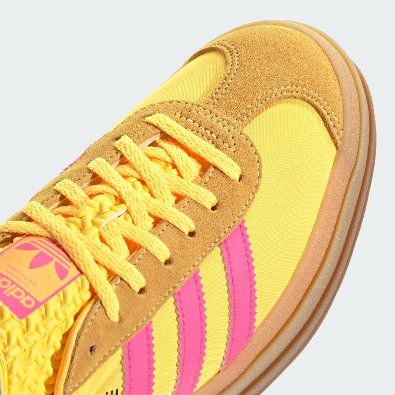adidas Gazelle Bold with layered platform midsole, vibrant colors, and suede and nylon upper.