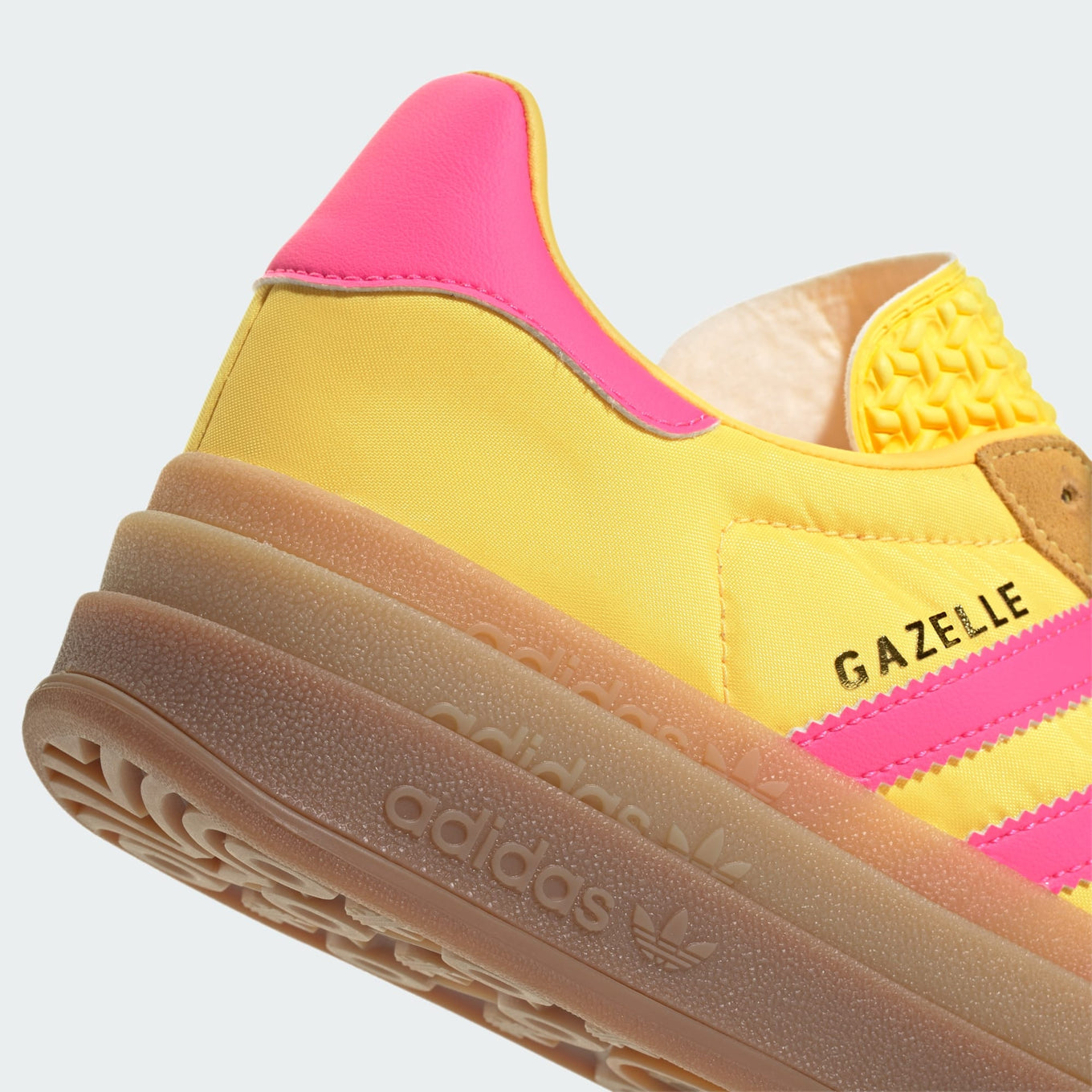 adidas Gazelle Bold with layered platform midsole, vibrant colors, and suede and nylon upper.