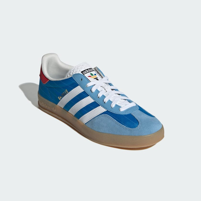 adidas Gazelle shoes with satin upper, suede and synthetic overlays, pinstripe details, and translucent gum outsole.