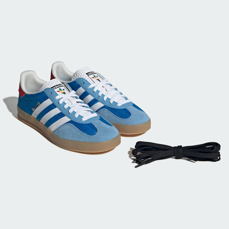 adidas Gazelle shoes with satin upper, suede and synthetic overlays, pinstripe details, and translucent gum outsole.