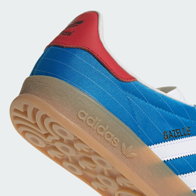 adidas Gazelle shoes with satin upper, suede and synthetic overlays, pinstripe details, and translucent gum outsole.