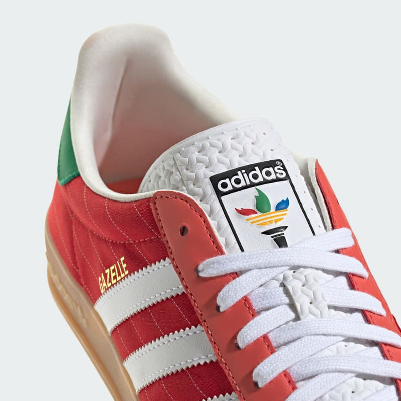 adidas Gazelle shoes with satin upper, suede and synthetic overlays, pinstripe details, and translucent gum outsole.