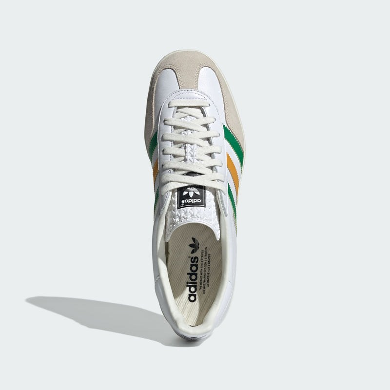 Adidas Gazelle Indoor shoes with premium suede upper and two-tone 3-Stripes, showcasing retro style and comfort.