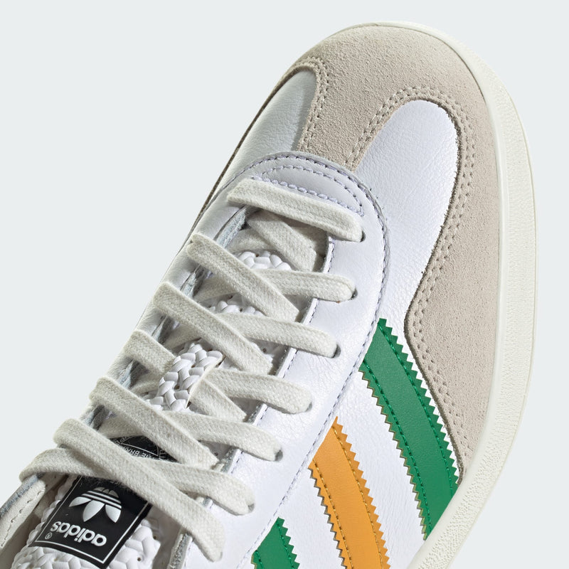 Adidas Gazelle Indoor shoes with premium suede upper and two-tone 3-Stripes, showcasing retro style and comfort.