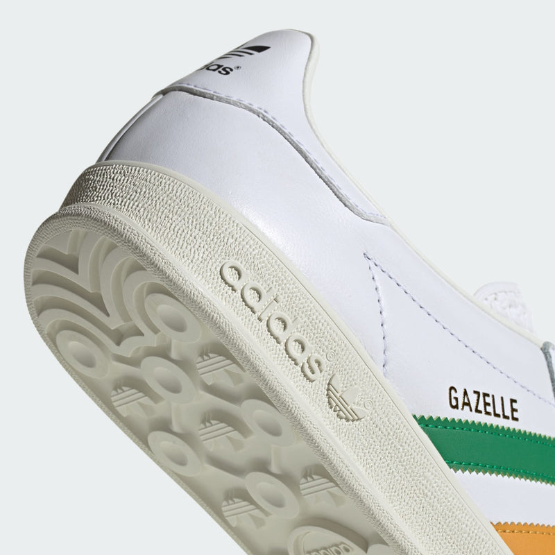 Adidas Gazelle Indoor shoes with premium suede upper and two-tone 3-Stripes, showcasing retro style and comfort.