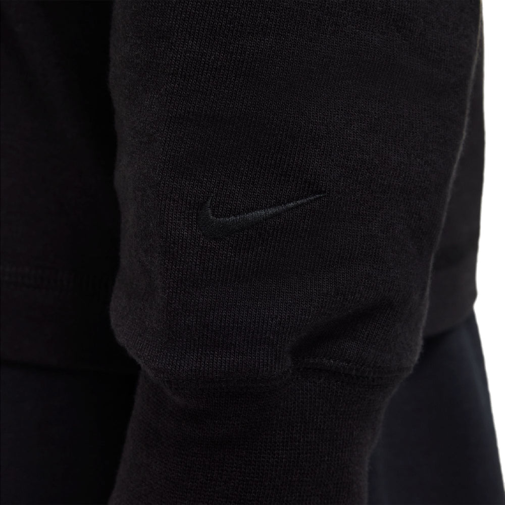 Soft wool/cotton blend T-shirt with loose fit, perfect for layering.