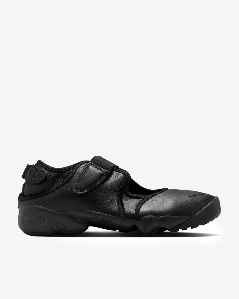 Air Rift Pure Platinum sneaker-sandal hybrid with full-grain leather upper, adjustable straps, split-toe design, and plush foam midsole with Air cushioning.