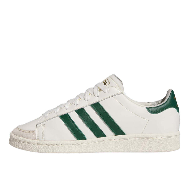 Adidas low-cut leather basketball shoes with rubber outsole, honoring the style of a basketball legend.