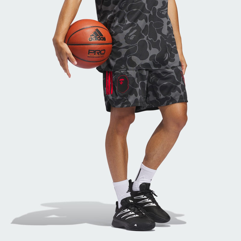 Damian Lillard x BAPE® basketball shorts in breathable polyester mesh, featuring drawcord-adjustable waistband and distinctive Dame and BAPE® graphics.