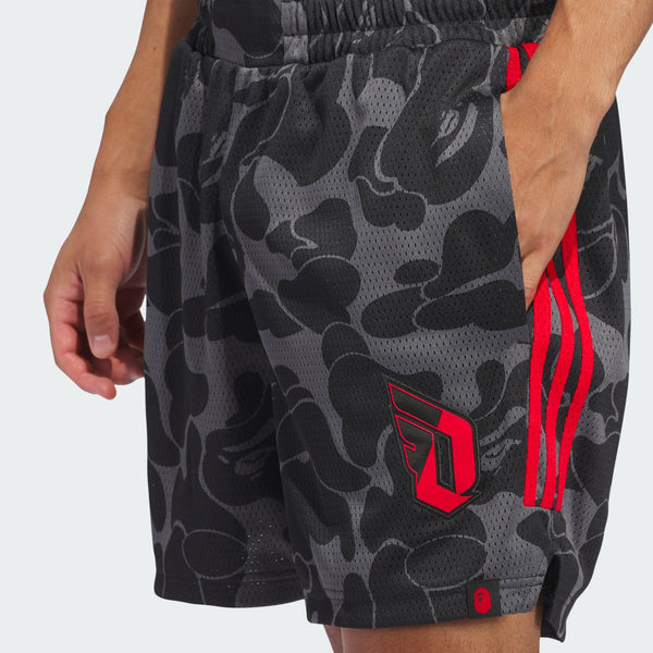 Damian Lillard x BAPE® basketball shorts in breathable polyester mesh, featuring drawcord-adjustable waistband and distinctive Dame and BAPE® graphics.