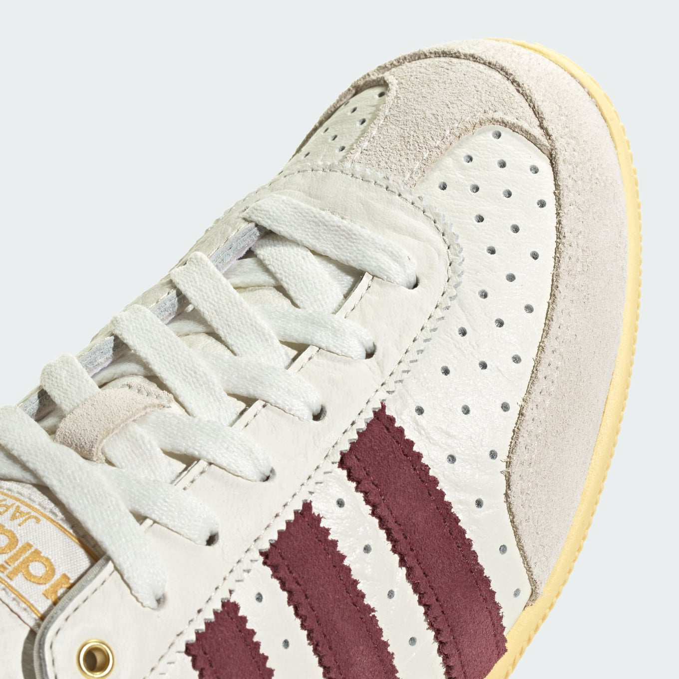 adidas Japan shoes with a sleek low-profile design, double-stitched T-toe, and heritage-inspired detailing.