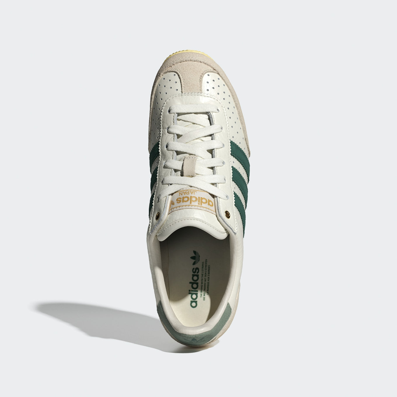 adidas Japan shoes with a vintage low-profile silhouette, double-stitched T-toe, and heritage-inspired detailing.