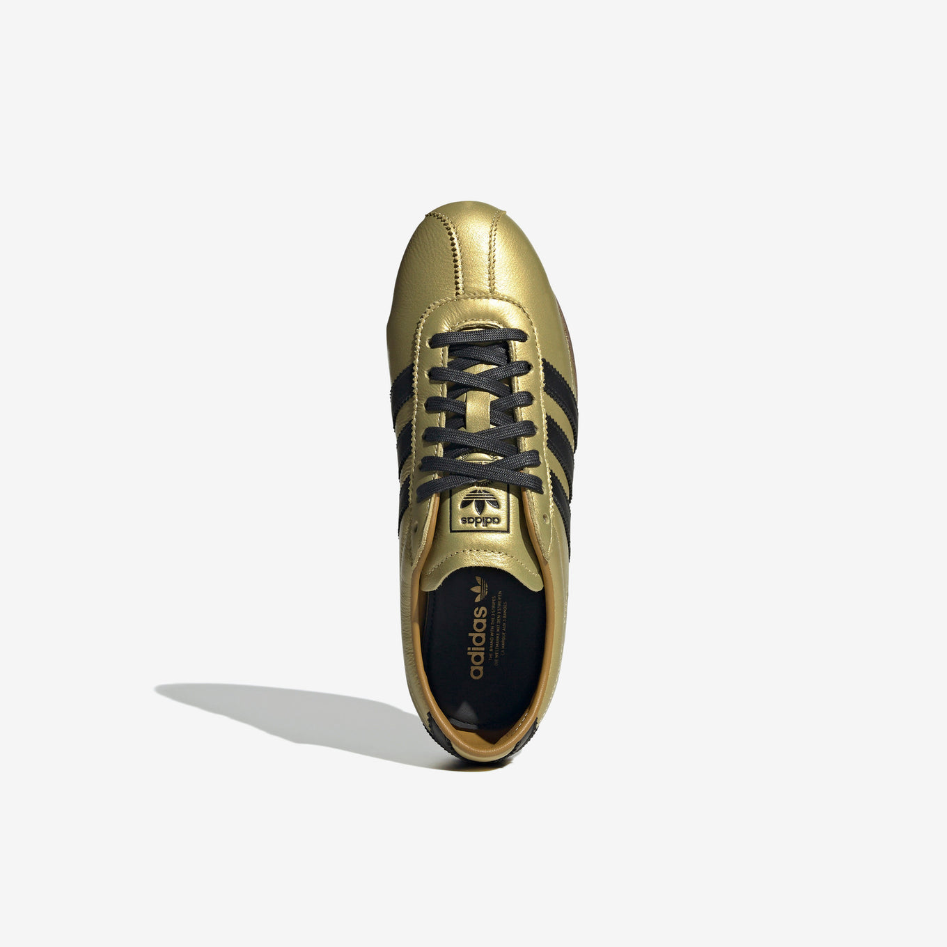 adidas Tokyo shoes with a soft leather upper, serrated 3-Stripes, and a low-profile rubber sole, inspired by vintage track and field trainers.