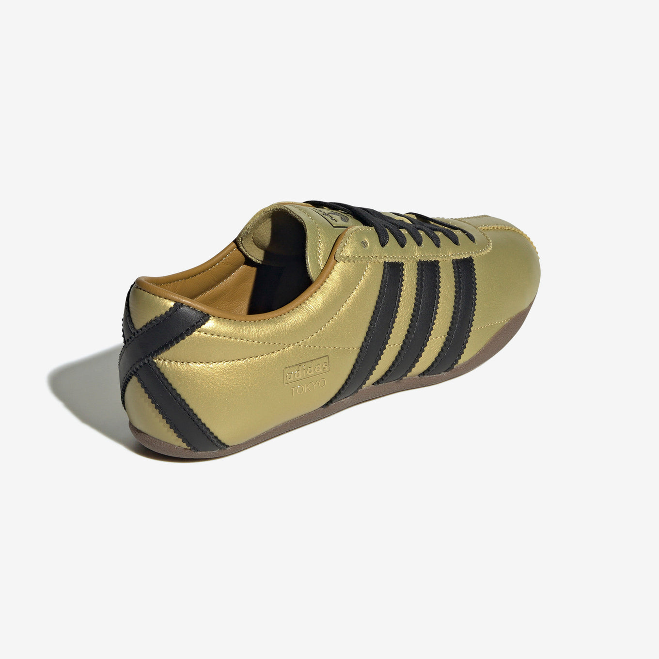 adidas Tokyo shoes with a soft leather upper, serrated 3-Stripes, and a low-profile rubber sole, inspired by vintage track and field trainers.
