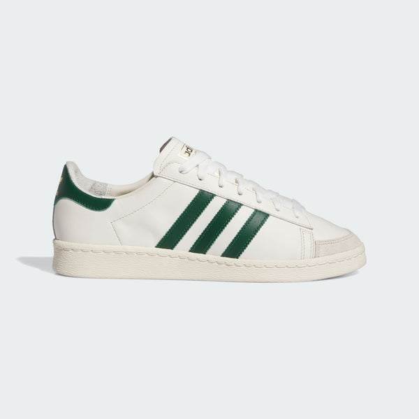 Adidas low-cut leather basketball shoes with rubber outsole, honoring the style of a basketball legend.