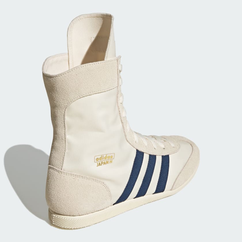 adidas Japan High Shoes featuring a high-top nylon and suede upper, extended tongue, lace-up closure, EVA wedge sole, and bold 3-Stripes with gold-letter branding.