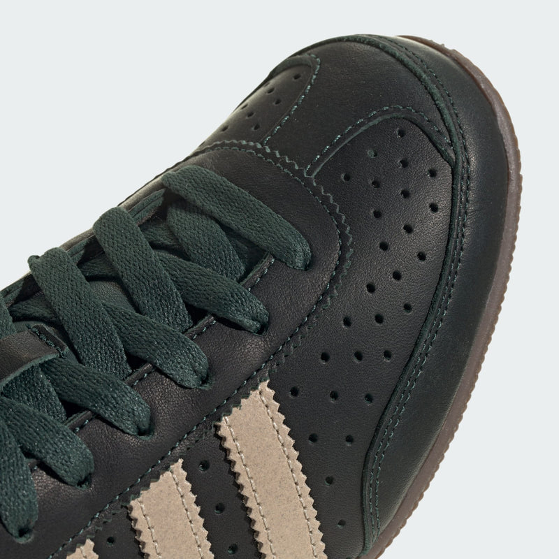 Adidas Japan shoes, reissue of the 1964 trainer, featuring a low-profile design and double-stitched T-toe detail.


