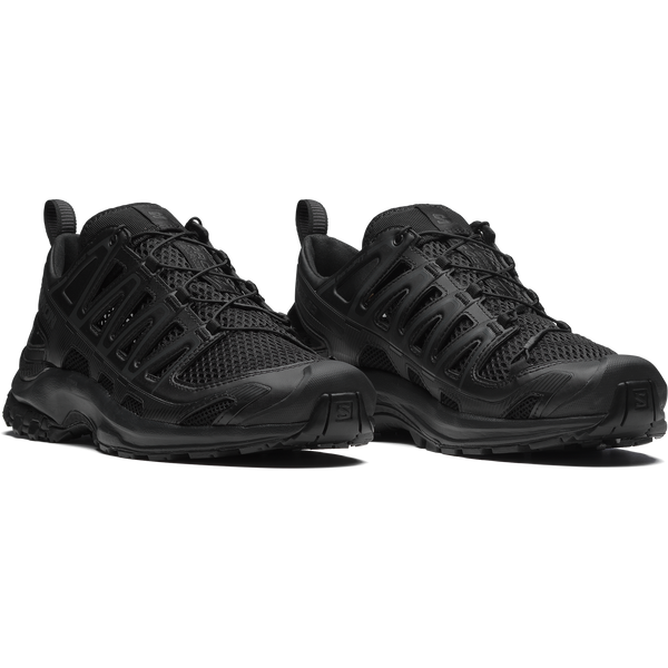 Salomon XA Pro 3D trail shoe with stable chassis, Quicklace™ system, and grippy Contagrip® outsole for rugged terrain.