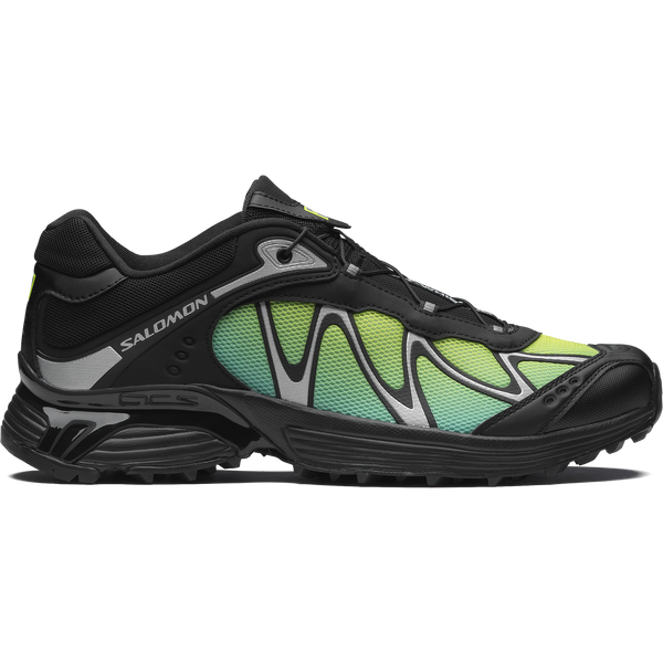 Salomon XT-Whisper sneaker with a textured, layered design, wavy Sensifit™ technology, Quicklace system, and a premium material upper for enhanced fit and style.